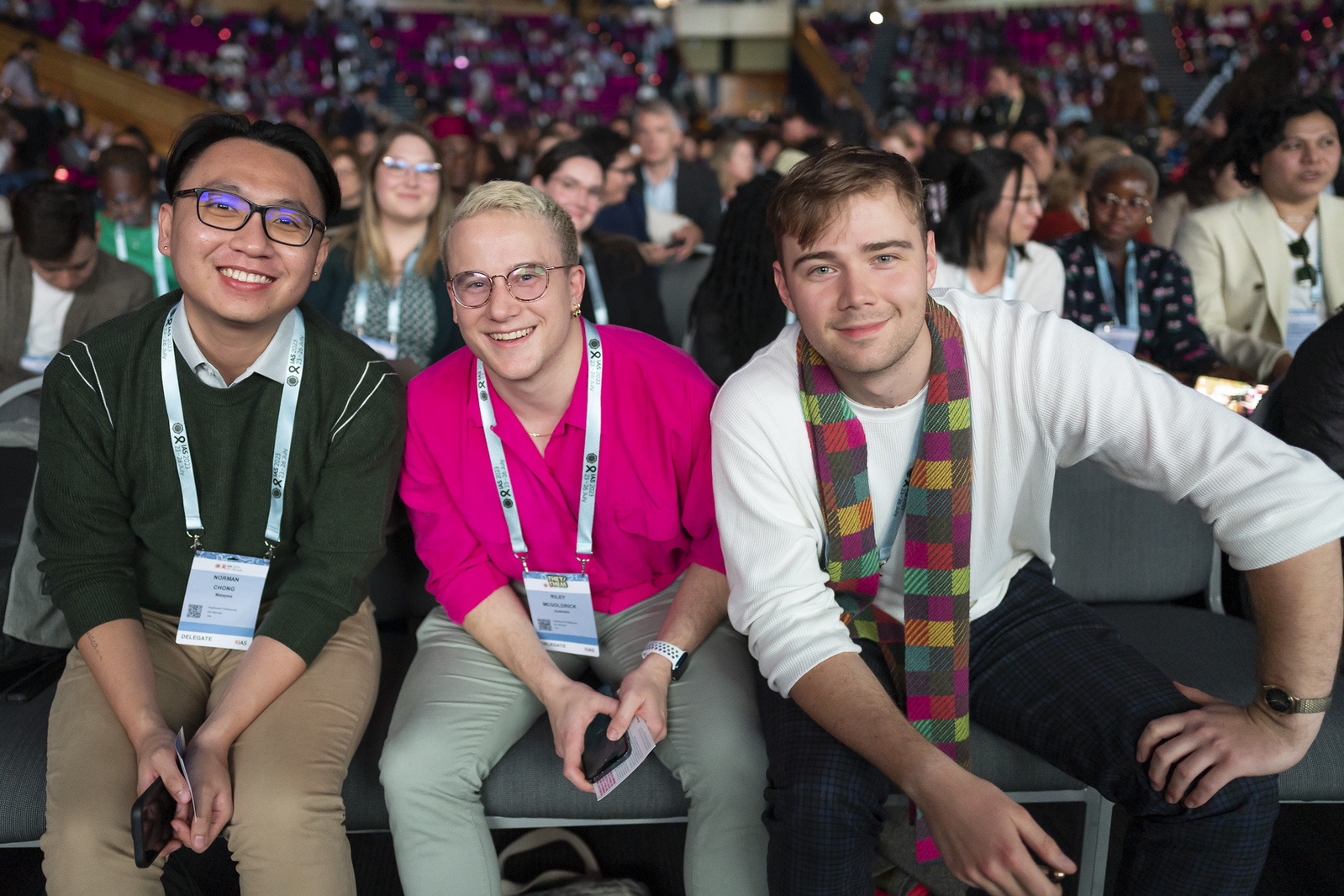 Image: Delegates at the Opening Ceremony of the 12th IAS Conference on HIV Science, July 2023 (L-R: Norman Chong, IAS Young Leader and Research Coordinator at the University of Malaya, Malaysia, Riley McGoldrick, Australia and University of Melbourne Rory Shepherd, Postgraduate Researcher in the Lewin Lab at the Doherty Institute, Australia) - © Conor Ashleigh/IAS